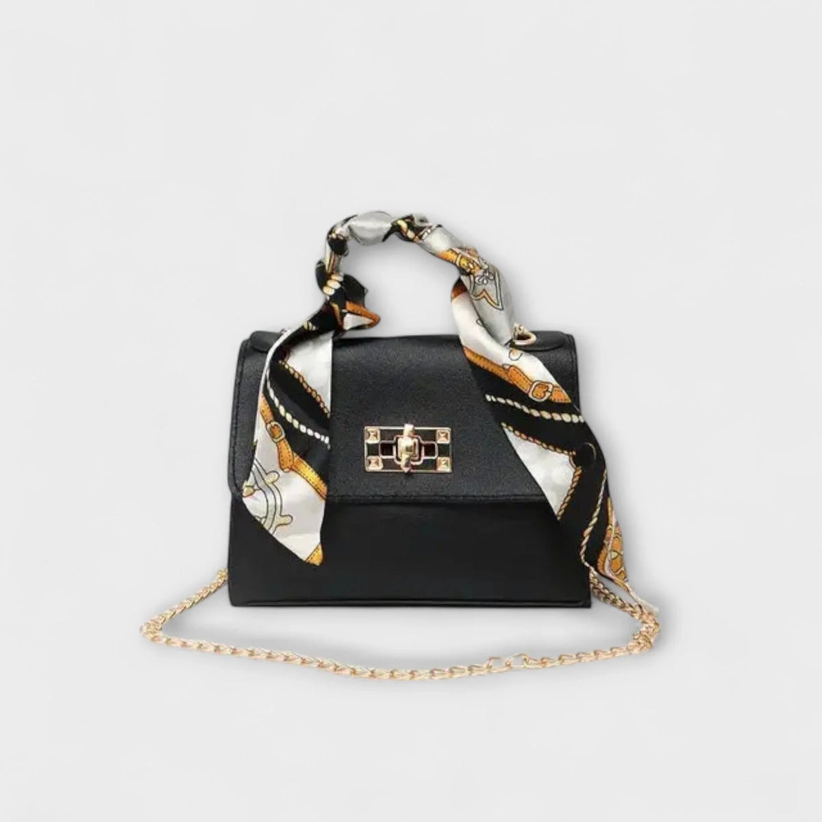Black faux leather handbag with scarf handle and chain strap.