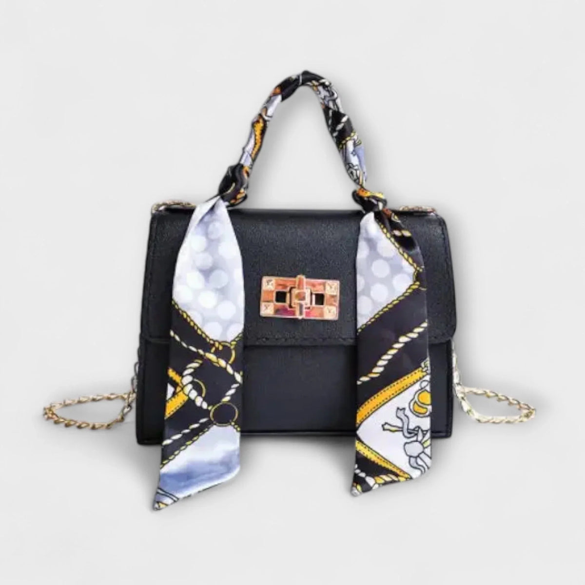 Black crocodile faux leather handbag with scarf handle and chain strap.