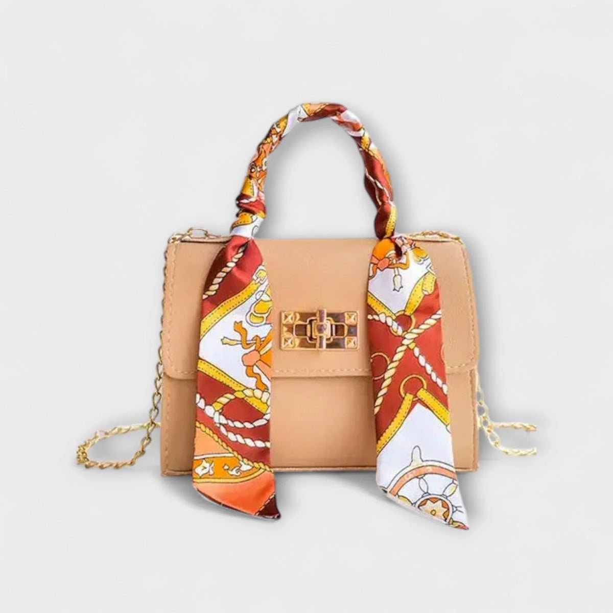 Light brown faux leather handbag with scarf-wrapped handle and metal chain strap.