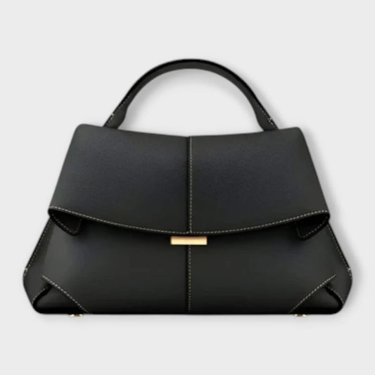 Black leather top-handle handbag, flap closure, contrast stitching.