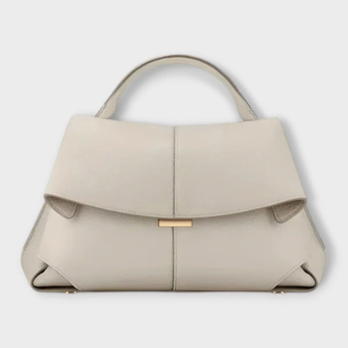 Black leather top-handle handbag with flap closure and contrast stitching.