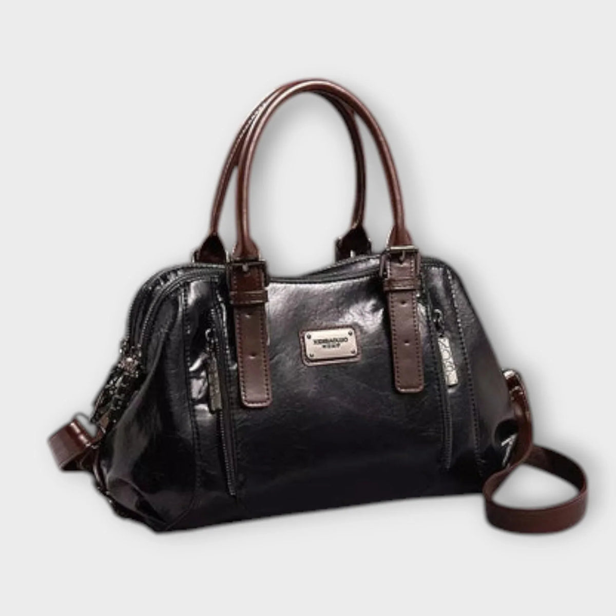 Structured black faux leather handbag with top handles and zip pockets.