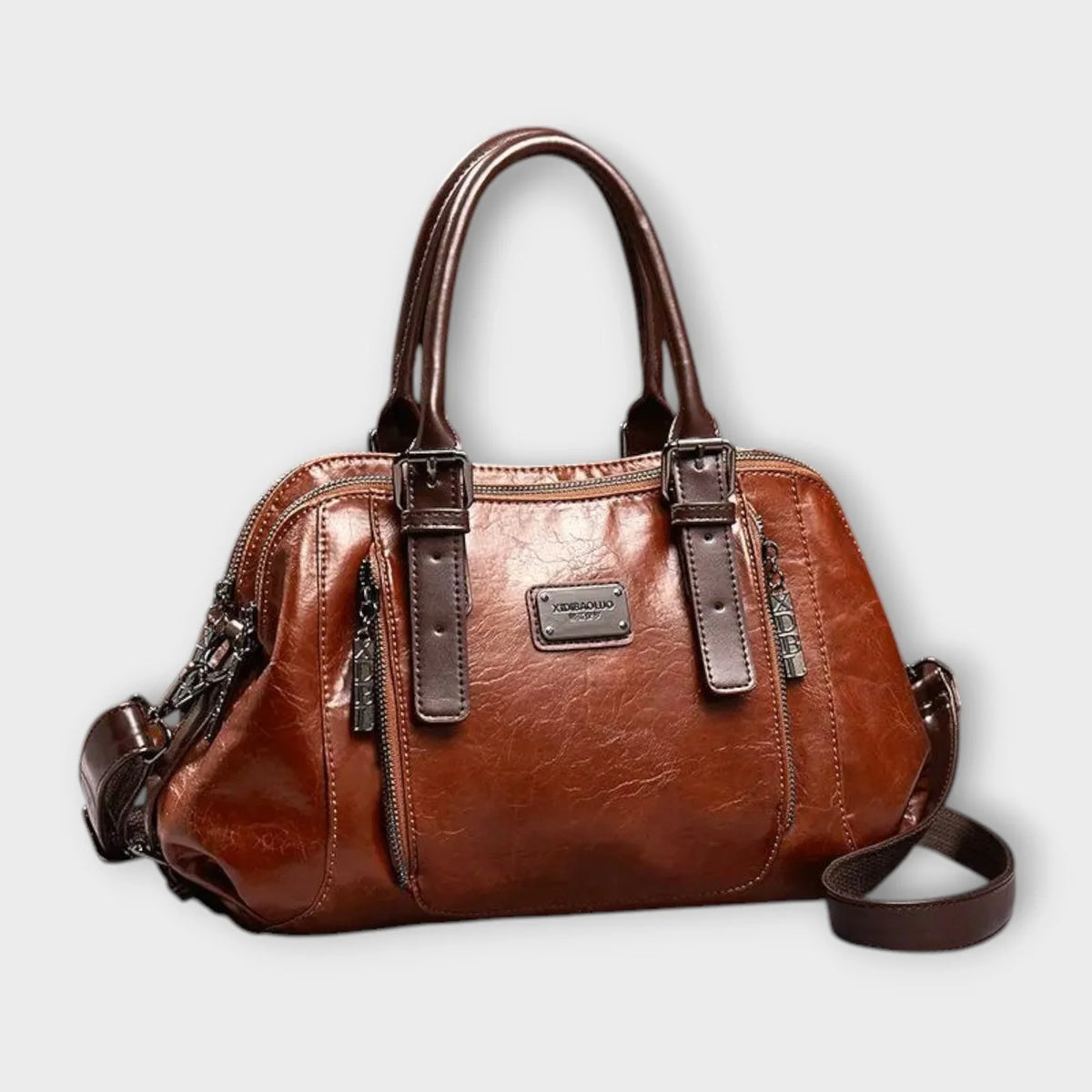 Structured brown faux leather handbag, top handles, zip pockets.