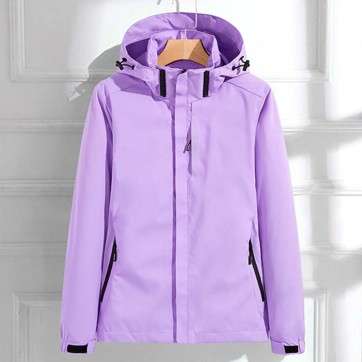 Women's waterproof hooded adjustable-fit rain jacket in Lilac